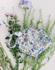 Relax and unwind with the Spritz Wellness aromatherapy eye mask, handcrafted in Liberty London Wild Flower fabric and gently scented for calm and comfort.
