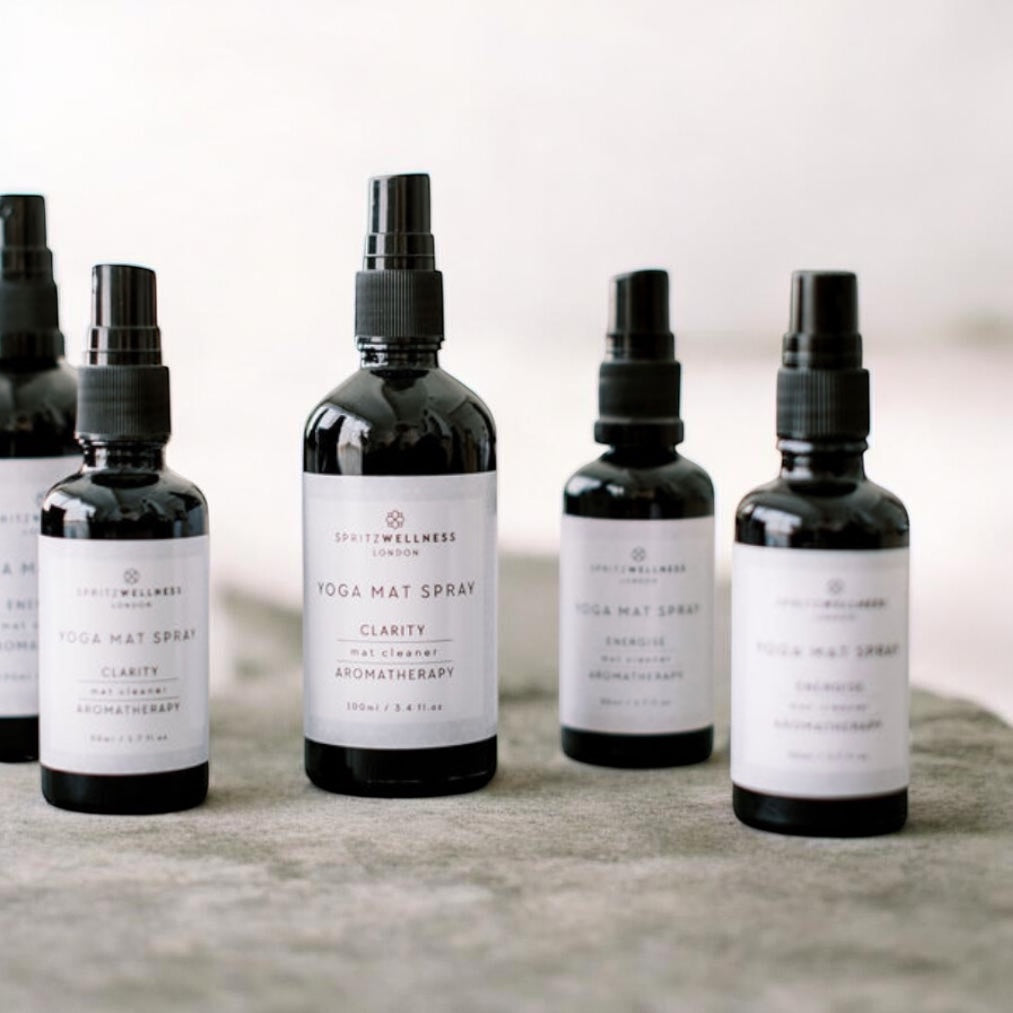 Cleansing and charging a yoga space with Spritz Wellness mat spray