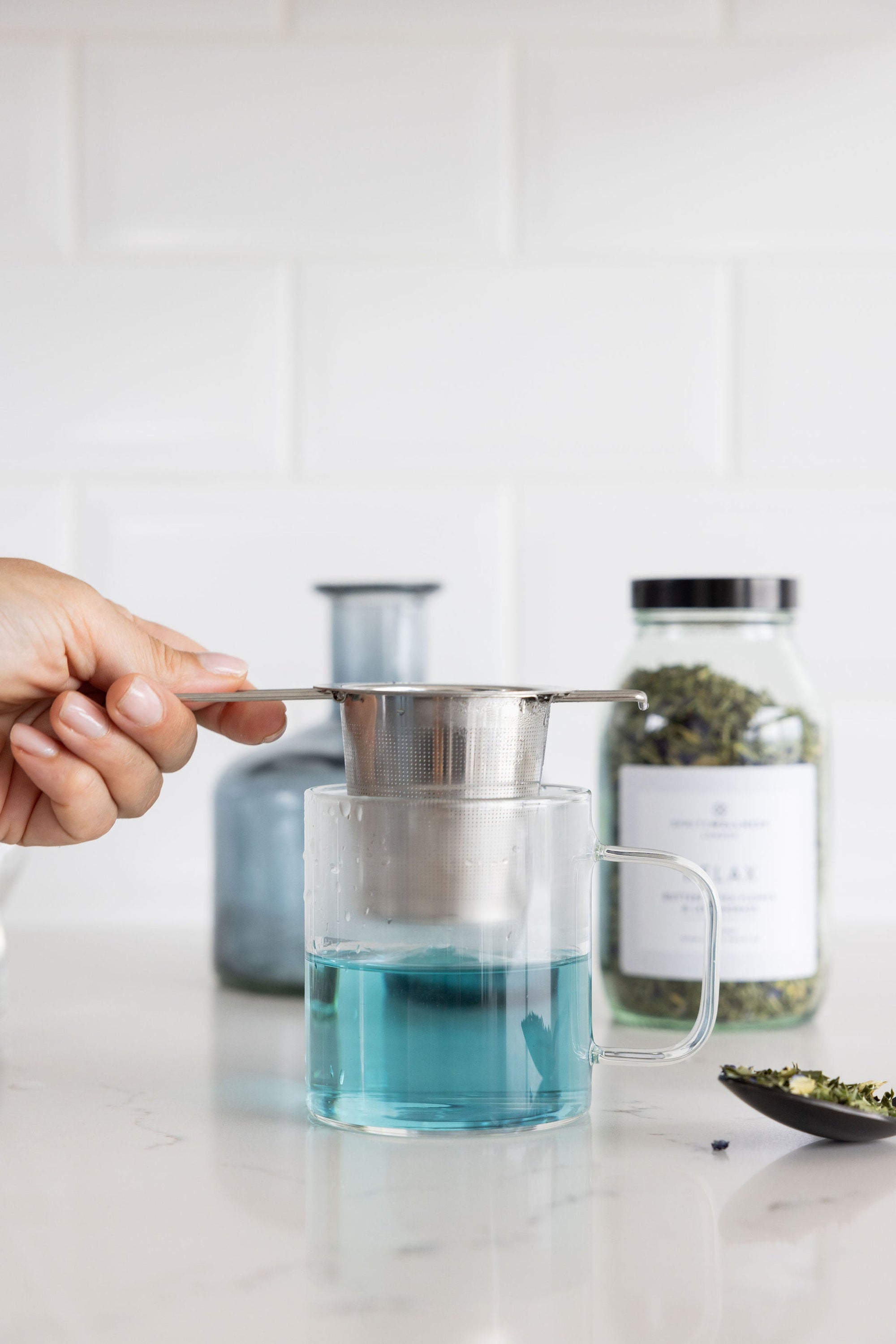 Spritz Wellness butterfly pea flower tea, a blue herbal brew