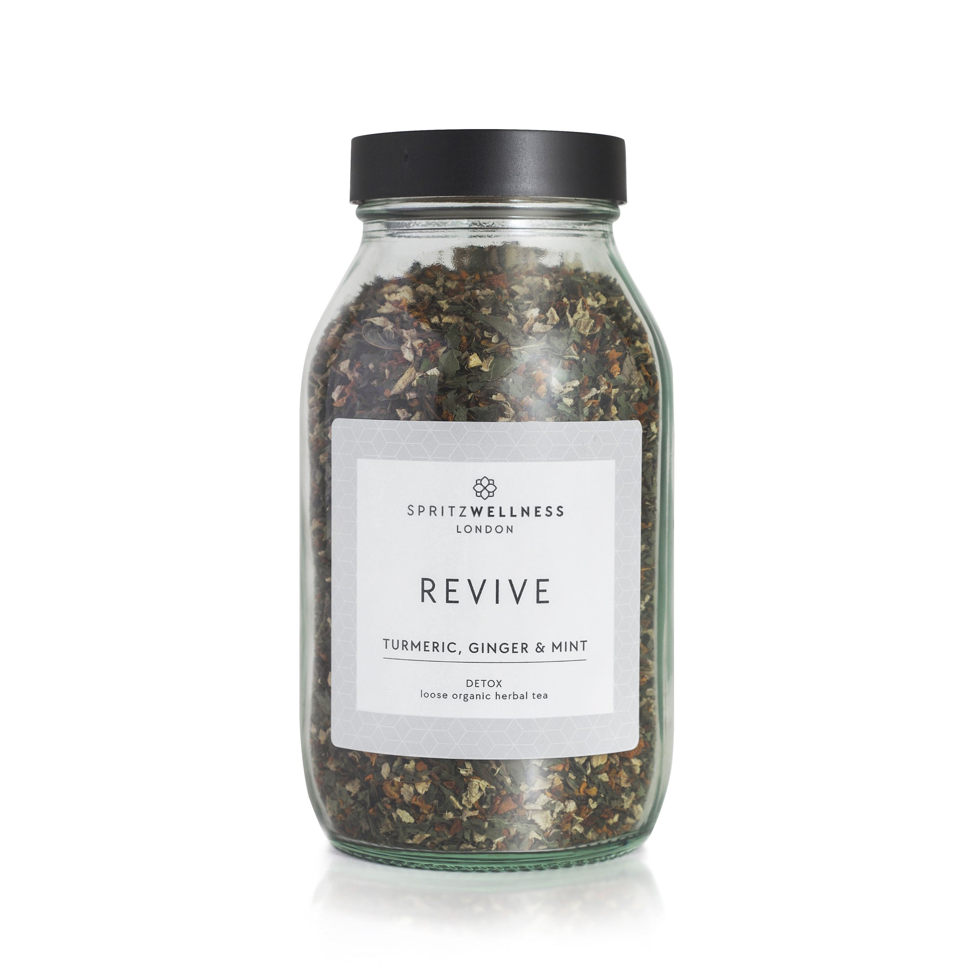 Jar of 'Revive' herbal tea blend with a label on a white background by spritzwellness
