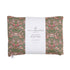 A rectangular aromatherapy wheat bag with a floral liberty print design in pink, green, and other colors, and a white label in the center that reads 'SPRITZ WELLNESS' and other text.