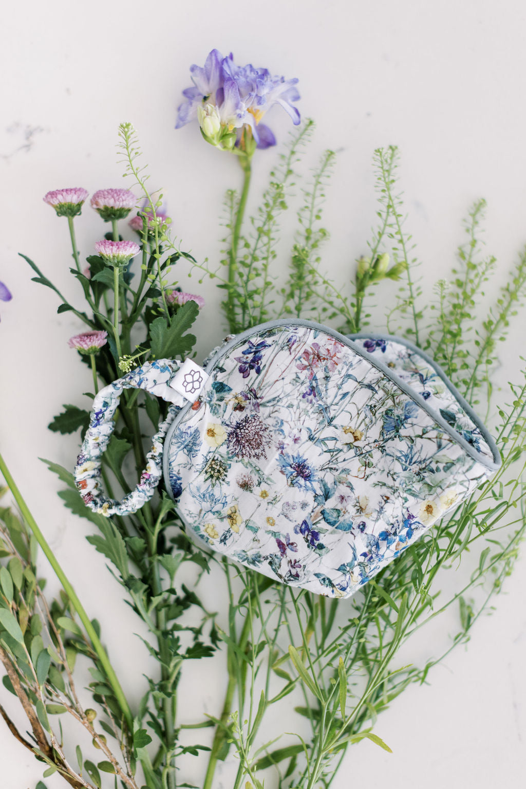 Relax and unwind with the Spritz Wellness aromatherapy eye mask, handcrafted in Liberty London Wild Flower fabric and gently scented for calm and comfort.