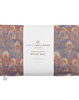 The image displays a rectangular aromatherapy wheat bag with a liberty print in Hera Brown color, predominantly featuring shades of blue and brown.