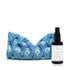 Aromatherapy eye pillow and yoga mat spray used during a calming yoga practice